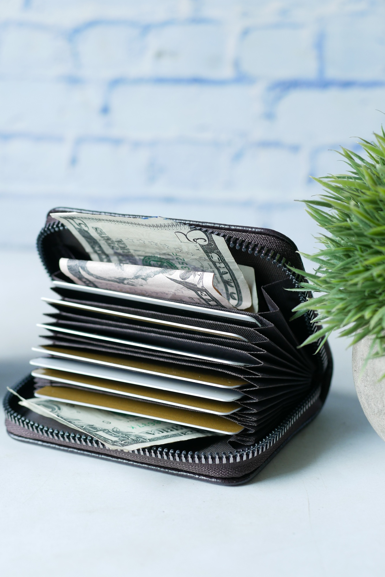 close up of credit cards in a wallet on wooden background